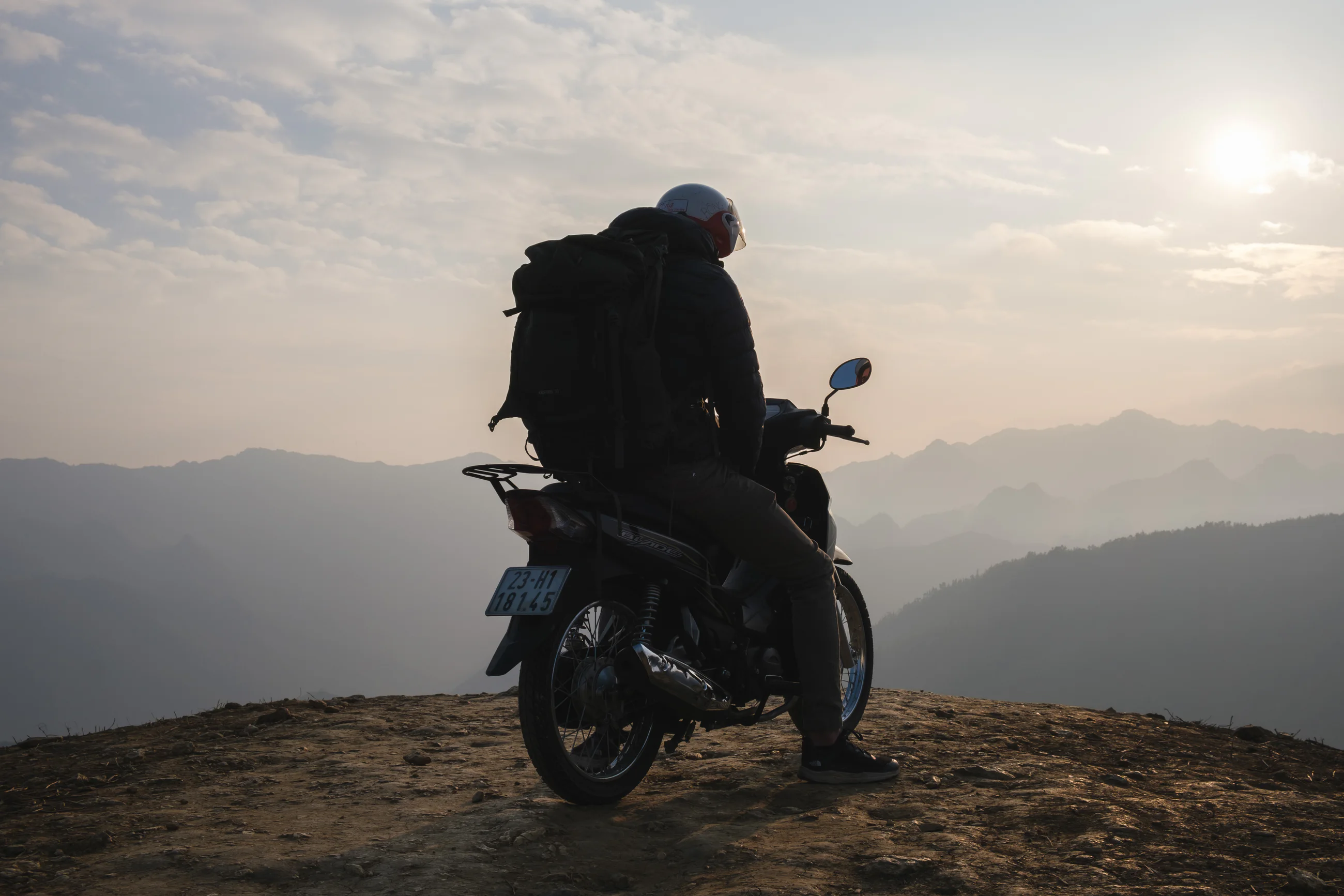 Arne den Boon with a motorbike in the mountains